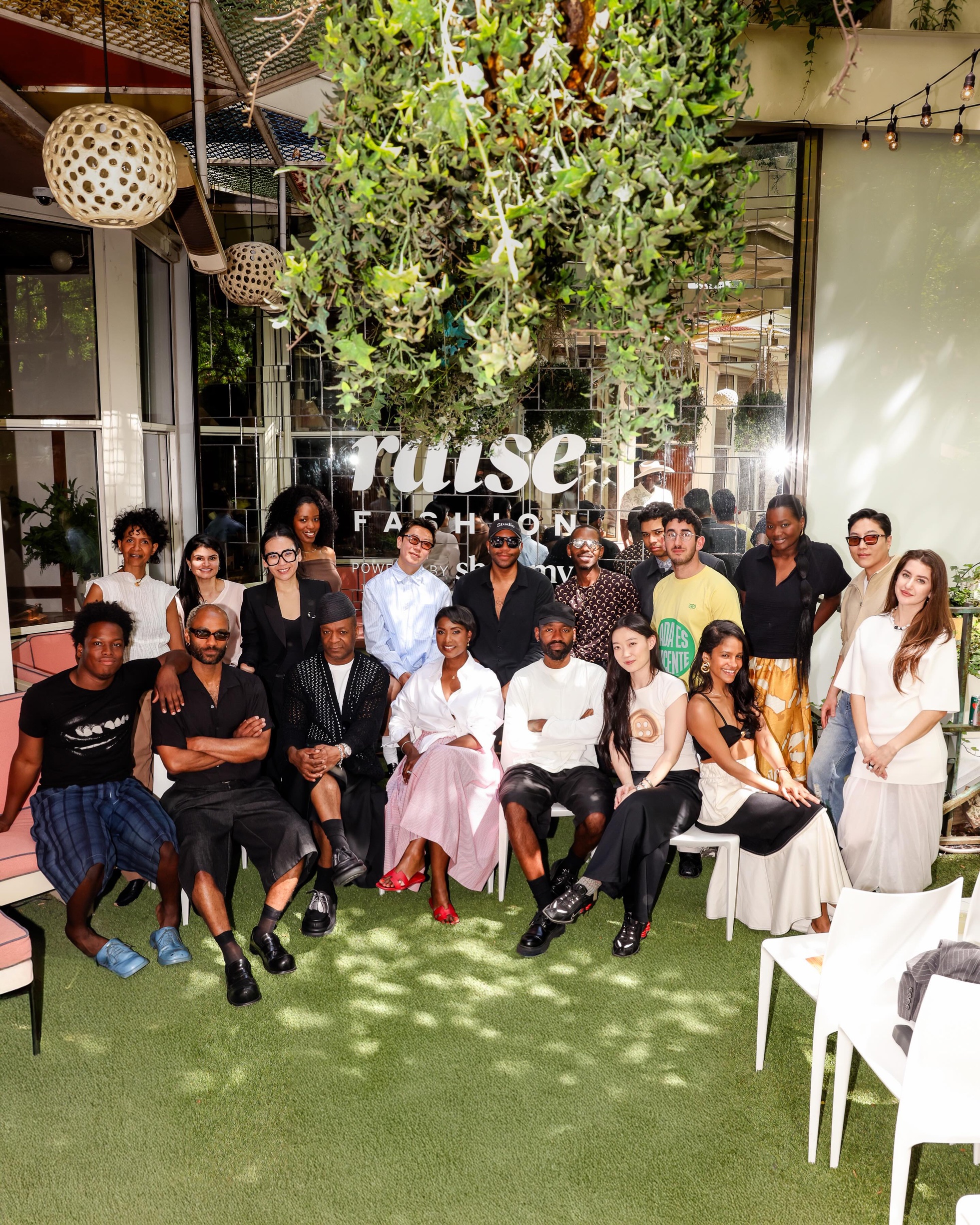 Group photograph at a RAISE Fashion event, makeup by Rebecca Lee Artistry